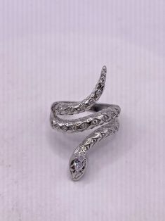 Symbolic Silver Diamond Jewelry, Silver Diamond Snake Ring Gift, Symbolic Adjustable Jewelry For Formal Occasions, Silver Symbolic Jewelry For Anniversary, Sterling Silver Snake-shaped Rings, Antique Hand Set Silver Jewelry, Vintage Hand Set Round Jewelry, Antique Hand Set White Gold Jewelry, Antique White Gold Hand-set Jewelry