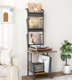 a living room filled with furniture and a book shelf