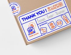 a box with some stickers on it that says thank you