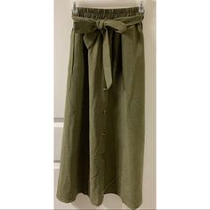 Never Worn. Ankle-Length, Suede-Like, Olive Colored Skirt. Buttons Down The Front, Elastic In The Back Of The Waist, And A Matching Tie Belt. Very Flowy. Olive Color, Ankle Length, Maxi Skirt, Womens Skirt, Red, Women Shopping, Color