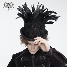 Elevate your gothic ensemble with the Men's Gothic Floral Embroidered Feather Top Hat, a masterpiece of intricate design and gothic elegance. Crafted from high-quality wool fabric, this top hat boasts a luxurious feel and enduring durability, making it a standout addition to your alternative wardrobe. 
 
The hat features a beautifully curled brim lined with braided lace, enhancing its gothic Victorian charm. Floral embroidery adorns the hat, meticulously stitched to create an ornate pattern that Gothic Mode, Feather Top, Gothic Floral, Men's Brooch, Gothic Elegance, Gothic Hairstyles, Gothic Boots, Gothic Wedding Dress, Punk Dress