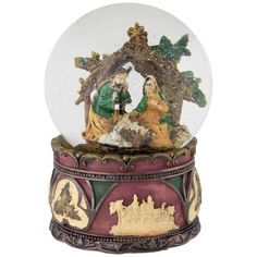 a snow globe with nativity scene in it