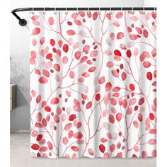 a shower curtain with red leaves on it