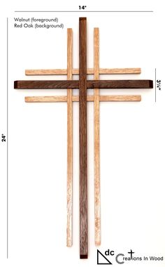 a cross made out of wood with measurements