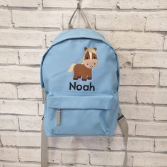 This cute personalised backpack is now available in 2 sizes  TODDLER SIZE Bag Dimensions- 23x35x12cm  Capacity- 6 Litres  JUNIOR SIZE 28x38x19cm Capacity 12 litres  Can fit an A4 folder. Both come with adjustable padded Shoulder straps and padded back panel for comfort and made from 600D polyester.  PLEASE NOTE THE GREY BAG DOES NOT COME WITH PADDED STRAPS BUT ARE FULLY ADJUSTABLE. Comes embroidered with a beautiful cute horse design and name of choice. Great bag to use for nursery, school or tr Customizable Blue Backpack For Travel, Customizable Standard Backpack For Back To School, Customizable Softback School Bag, Cute Personalized Bags For School Events, Customizable Bags For Back To School, Customizable Student Bags For Back To School, Personalized Softback School Bag, Customizable Standard Backpack For Travel, Customizable Blue Standard Backpack