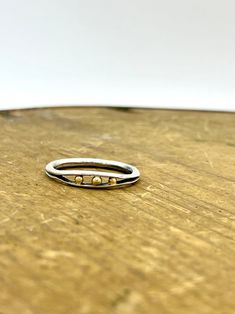 This mixed metal ring consists of sterling silver and solid 18k gold. Each is unique and made by hand. Ring Bands Silver, Stacked Rings Mixed Metal, Gold And Silver Rings Mixed, Mixed Metal Ring Stack, Grad Accessories, Mixed Metal Ring, Mixing Metals, Mixed Metal Rings, Mixed Metal Jewelry