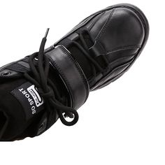 a pair of black shoes with the words high - quality upper written on them and below it