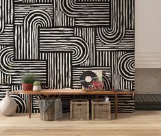 a black and white abstract wallpaper design in a living room with wicker baskets