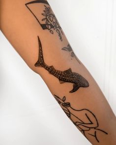 a person with a tattoo on their arm