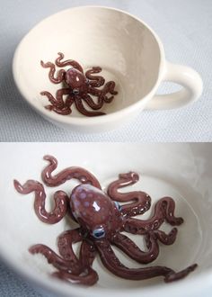 an octopus is sitting in a bowl on the table