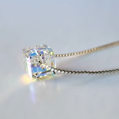 8mm Crystal Cube with an 18 inch silver chain. They also bring positive energy, hope, joy, good luck, and diffuse negative energy. Silver Bridesmaid, Crystal Anklet, Cube Necklace, Swarovski Crystal Jewelry, Swarovski Crystal Bracelet, Crystal Bangle, Silver Anklets, Healing Jewelry, Christian Jewelry