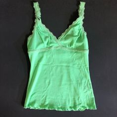 Forever21 Green Top 100% Nylon Size: S Never Worn / No Tags Green Tops With Built-in Bra For Spring, Trendy Lace Trim Camisole For Spring, Trendy Camisole With Built-in Bra For Spring, Spring Solid Color Tank Top With Lace Trim, Trendy Stretch Camisole For Spring, Spring Cotton Stretch Camisole, Spring Stretch Cotton Camisole, Trendy Stretch Green Camisole, Spring Tank Top With Built-in Bra