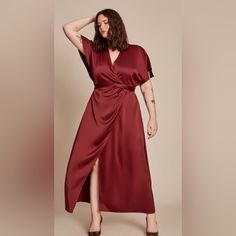 The Precious Is A High-Necked Wrap Dress Cut From A Mid-Weight Textured Satin. It Is Intended To Fit Loose Though The Top, Fitted At The Waist, And Flares Out To A Full Skirt. Featuring Dolman Flutter Sleeves, A Surplice Neckline, And Faux Wrap Skirt, Use The Removable Self-Tie Belt To Cinch The Waist. A Must-Have! Round Out Your Vacation And Weekend Wardrobe With This Plus Size Dress Woven Fabrication Zip Closure Cutout Detail Faux Wrap Front Slit Lined High Neckline Short Sleeves Dresses Materials, Slinky Mini Dress, Faux Wrap Skirt, Fall Wedding Guest Dress, Weekend Wardrobe, Plus Size Wedding, Animal Print Dresses, Neck Wrap, Wearing Red