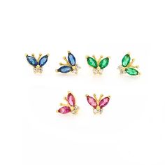 "Earrings details : ♥So cute these butterfly stud earrings. Absolutely the perfect gift for any occasion and stacks well with other Earring styles. ♥Details Metal: Available in solid white, yellow, or rose gold 14k. Height:7 mm Width: 5 mm Thickness: 1.3mm Stone material: Available in natural diamond, Ruby, Emerald, Sapphire, or clear cubic zirconia, please specify when placing your order. Stone shape: 4 Round+ 4 Marquise Total number of stones: 8 Stone setting: prong setting Finish: high polish Butterfly Shaped Fine Jewelry Earrings For Gifts, Butterfly Shaped Fine Jewelry Earrings, Butterfly Shape Fine Jewelry Earrings For Gift, Cubic Zirconia Butterfly Charm Earrings For Gift, Emerald Stud Earrings, Earrings Butterfly, Diamond Butterfly, Emerald Earrings Studs, Butterfly Earrings Stud