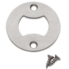 a metal plate with screws and two screws on the bottom one has a hole in it