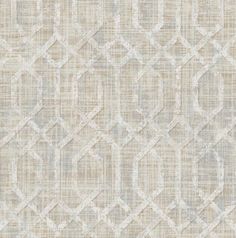 a beige and white rug with an abstract design