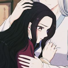 an anime character is holding another person's head