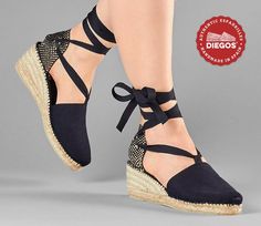 "Black espadrilles Lola high wedge for women. Wedge sole height: 2.5\" (6 cm) These classic high wedge Loal espadrilles have cotton ties that are easily tied to the ankle for a full support. For added comfort, a padded insole is hand-stitched to the espadrilles' jute wedge sole. True to Spanish tradition, the cotton canvas is completely hand-stitched to the jute rope sole. THIS ESPADRILLE IS NOT CHINA! IT IS THE CLASSIC SPANISH ESPARDENYA SEWN BY ALPARGATERA RIOJANA. AS IT MUST BE; )" Low Wedge Espadrilles, Spanish Shoes, Ivory Flats, Lace Espadrilles, Espadrilles Shoes, Northern Spain, Wedge Espadrilles, High Wedges, Low Wedges