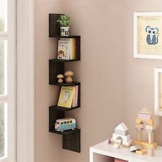 a wall shelf with books and toys on it