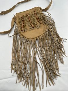 Beige fringe bag w long strap and pockets zipper size small. New bag recycling materials. Recycling Materials, Fringe Bags, New Bag, Etsy Accessories, Recycling, Accessory Gift, Gift Card, Pet Supplies, Electronic Accessories