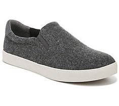 A perfect blend of skate park cool and city chic, the Madison slip-on sneaker offers a sleek profile, classic white rubber sidewalls, and an insole that keeps feet happy all day. From Dr. Scholl's. Gray Slip-on Sneakers With Ortholite Insole, Sporty Low-top Slip-ons For Everyday, Sporty Low-top Everyday Slip-ons, Sporty Everyday Low-top Slip-ons, Gray Slip-on Sneakers With Rubber Sole, Slip-on Sneakers For Skateboarding With Rubber Sole, Urban Slip-on Sneakers With Vulcanized Sole, Skateboarding Slip-on Sneakers With Rubber Sole, Gray Low-top Slip-ons With Rubber Sole