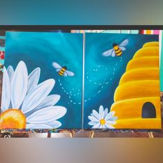 two paintings with bees and flowers painted on them, one has a beehive