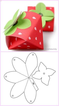 an origami strawberry box with paper cut out to look like it has been folded