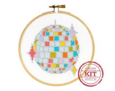 a cross stitch pattern with an image of a colorful ball on it and the words cross stitch