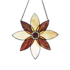 a stained glass flower hanging from a chain