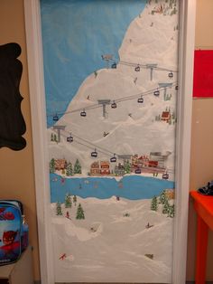 a door decorated to look like a ski resort