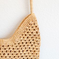 IN STOCK FAST SHIPPING FROM LOS ANGELES Take on the summer with our handmade raffia straw bag! With a large opening and long strap, this beach bag is perfect for all your sunny essentials. Simple, durable, and oh-so-cool, this large shoulder bag is the ultimate summer companion. Get ready to turn heads with this unique, stylish statement piece! Natural Soft Raffia Straw Handmade Size: 15"H x 15.5"W Strap drop length: 16" Designer Style ID: 8638 Beachy Sand-colored Straw Bag, Spring Beach Sand-colored Straw Bag, Sand-colored Straw Bag For Summer Beach, Summer Sand-colored Straw Bag, Beachy Natural Crochet Bag For Spring, Natural Palm Leaf Crochet Bag For Vacation, Eco-friendly Open Weave Straw Bag For Summer, Natural Fiber Beachy Shoulder Bag In Natural Color, Natural Fiber Beachy Shoulder Bag