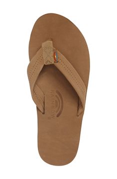 Soft leather straps and a leather footbed ensure cool comfort on a classic flip-flop. Style Name:Rainbow '301Alts' Sandal (Men). Style Number: 156578. Leather Slip-on Flip Flops With Ortholite Insole, Comfortable Leather Flip Flops With Ortholite Insole, Classic Leather Flip Flops With Cushioned Footbed, Leather Flip Flops With Cushioned Footbed, Brown Leather Slippers With Arch Support, Classic Flip Flops With Rubber Sole And Round Toe, Classic Flip Flops With Round Toe And Rubber Sole, Casual Leather Flip Flops With Arch Support, Adjustable Leather Slippers With Arch Support