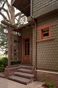 a house with steps leading up to the front door