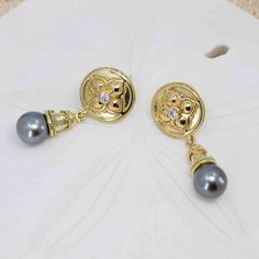 Diamond and Tahitian Black Pearl earrings in granulated 18K gold Elegant Gold Tahitian Pearl Earrings, Gold Tahitian Pearl Earrings For Anniversary, Gold Tahitian Pearl Earrings For Formal Occasions, Gold Tahitian Pearl Drop Earrings, Black Pearl Earrings, Tahitian Black Pearls, Gothic Earrings, Tahitian Pearls, Black Pearl