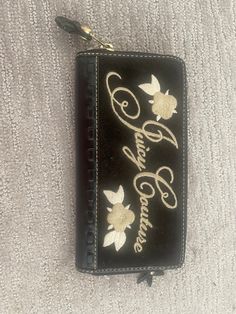 Brand new unused, with tags beautiful Juicy Couture wallet with brown and black color wave. Brass hardware. Beautiful flower detail with velvet and also has beautiful design inside with coin purse Juicy Couture Wallet, Vintage Juicy Couture, Color Wave, Handmade Brand, Clip Wallet, Flower Detail, Money Clip Wallet, Beautiful Flower, Brass Hardware