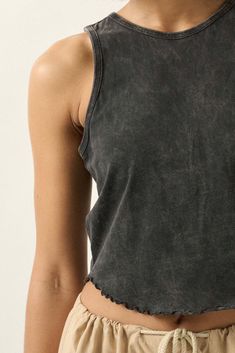 Mineral washed cotton tank top. Crew neckline. Sleeveless. Curved hem with lettuce-edge detailing. Racerback. Cropped length. Relaxed fit. 100% Cotton. Imported. Designed in LA. Model wears size S. Spring Cotton Racerback Muscle Tee, Stonewashed Tops For Everyday Summer Wear, Casual Soft-washed Sleeveless Muscle Tee, Summer Distressed Washed Black Tops, Summer Tops With Frayed Hem For Layering, Soft-washed Cotton Sleeveless Tank Top, Acid Wash Cotton Tank Top, Everyday Soft-washed Tank Top, Stonewashed Tops For Summer