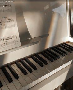 an electronic piano with sheet music on it