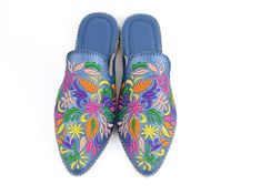 A Flat mules with floral embroidered and pointed toe offers a casual chic appearance for any ensemble. Classic flower leather mules get a charming update with embroidered floral pattern. Keep the feminine vibes going when you style these Pointed Toe Mules chalk pair with a satin maxi dress. Treat your feet to the best of things by choosing these backless loafers from Morocco! They are crafted from velvet textured leather and designed with engraved metal flower designs, could be a great Moroccan Traditional Flat Heel Spring Mules, Traditional Flat Heel Mules For Spring, Traditional Closed Toe Mules For Spring, Traditional Summer Mules With Pointed Toe, Traditional Slip-on Mules For Spring, Traditional Leather Mules For Spring, Traditional Leather Clogs For Spring, Flower Slippers, Feminine Vibes