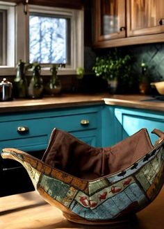 a bowl sitting on top of a kitchen counter next to a sink and stovetop