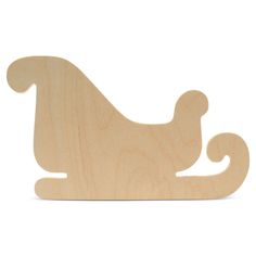 a wooden toy sleigh that is shaped like a dog