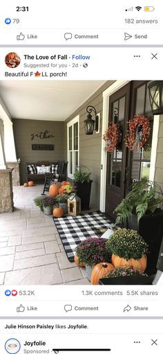 the front porch is decorated with pumpkins and greenery