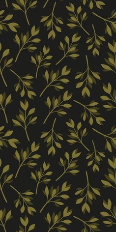 a black background with green leaves on it