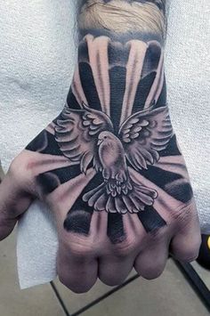 a person with a tattoo on their hand