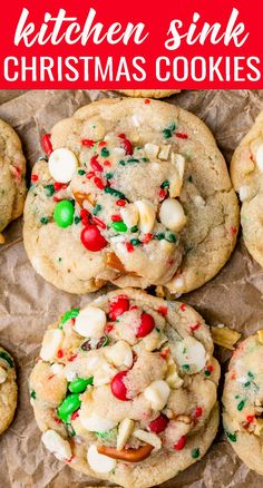 christmas cookies with white chocolate and sprinkles on parchment paper in front of the words, kitchen sink christmas cookies