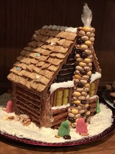 a gingerbread house made to look like it's been built into the ground