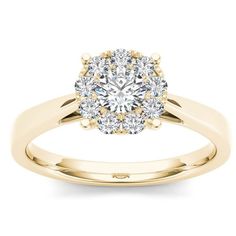 a yellow gold engagement ring with an oval diamond center surrounded by round brilliant cut diamonds