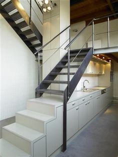 the stairs are made of metal and wood