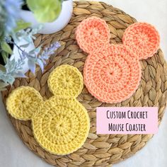 crocheted mickey mouse coasters on a woven basket