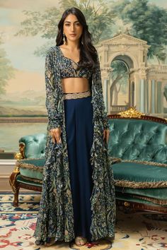 Navy blue georgette jacket with floral print. Comes with pant, a sequins hand embroidered padded blouse and a belt. - Aza Fashions Fitted Blue Outerwear For Designer Wear, Blue Fitted Outerwear For Designer Wear, Blue Georgette Long Sleeve Sets, Blue Long Sleeve Georgette Sets, Fitted Long Sleeve Georgette Sets, Long Sleeve Georgette Sets With Floral Print, Long Sleeve Georgette Choli With Sheer Dupatta, Long Sleeve Floral Print Georgette Sets, Elegant Blue Floral Print Outerwear