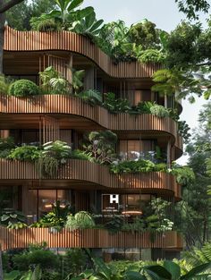 an apartment building with many plants growing on the balconies